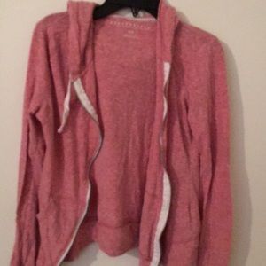 Pink sweater jacket.